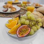 Light-filled Retreat With Balcony In By Hostwise