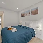 Light-filled Retreat With Balcony In By Hostwise Daire *